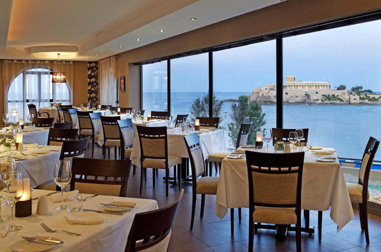 Corinthia Hotel St. George’s Bay San Giuliano Esterno foto The Phoenicia restaurant