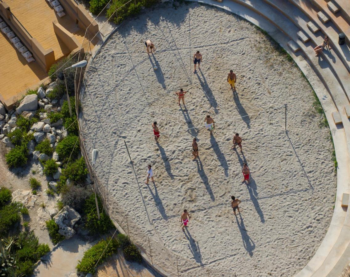 Corinthia Hotel St. George’s Bay San Giuliano Esterno foto Aerial view of the beach