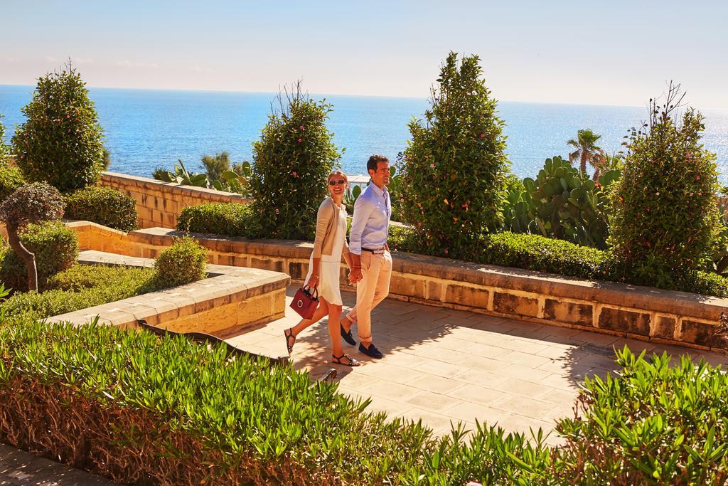 Corinthia Hotel St. George’s Bay San Giuliano Esterno foto The resort's gardens